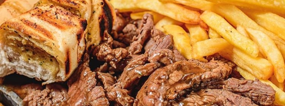 Gastronomia praiana de experiências no Espetto Carioca